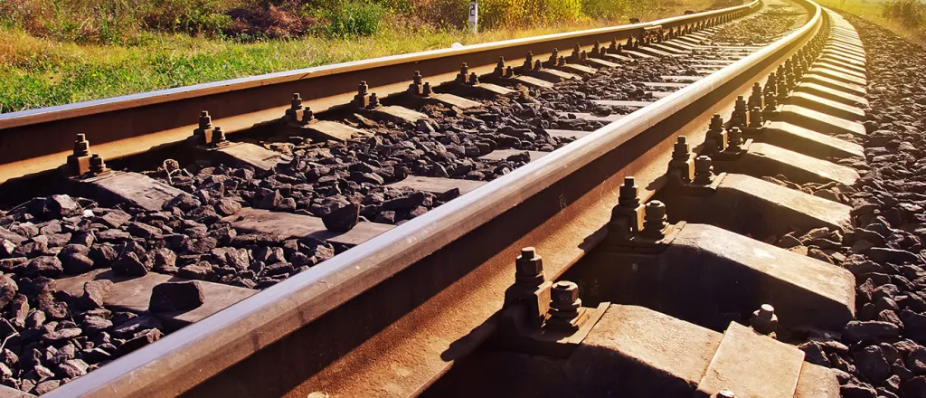 PROMO 64 Transportation - Rail Roadroad Track Line Sun - iStock - tycoon751 - 491070078