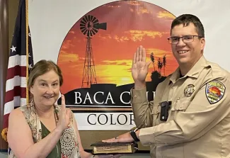 Keagan Gonzales being sworn in as Baca County Undersheriff.