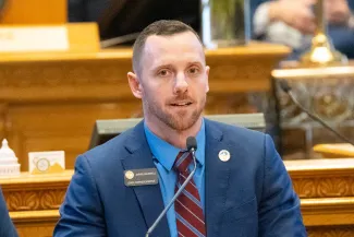 Colorado State Representative Jarvis Caldwell speaking on the floor of the Colorado state capitol.