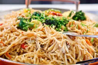 Close up of a plate of vegetable chow mein