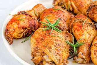 Platter of honey lemon chicken pieces.